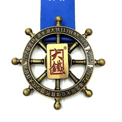 kupować Międzynarodowy Ironman 113 Triathlon Award Medal Spinning produkcja online
